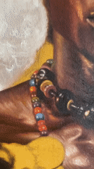 Painting of Two Jeweled Figures Filmed in Ado, Nigeria
