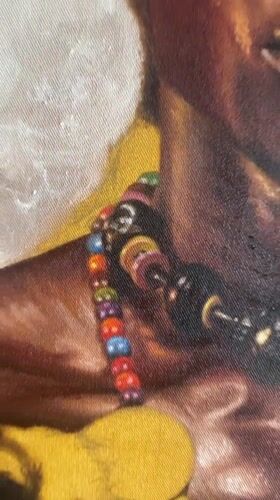 Painting of Two Jeweled Figures Filmed in Ado, Nigeria