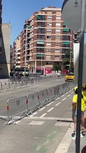 Professional cycling race rolls through central Barcelona streets