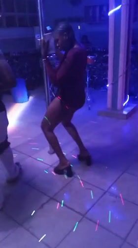Woman dances at nightclub in Ajaokuta, Nigeria
