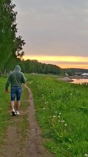 Evening strollers documented along Tallinn's Baltic Sea coastal paths