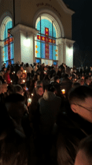 Candlelight vigil draws crowd outside Church of All Saints