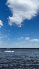 Summer morning leisure activities captured across Chaikovsky, Russia waterfront