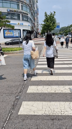 Late night street life and delivery activity in Suwon-si