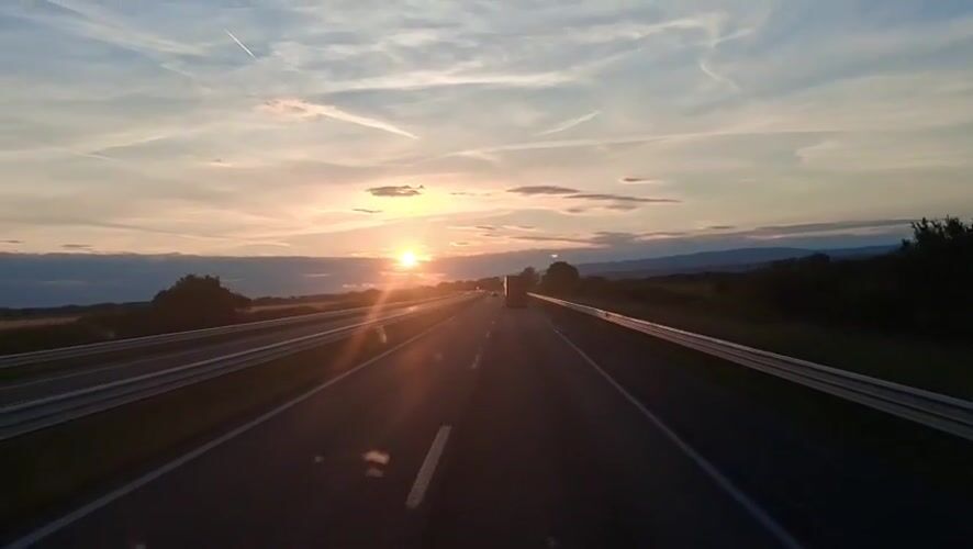 Sunset traffic captured on Croatian highway near Komarnica