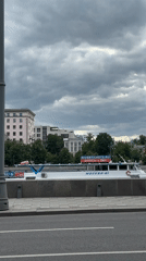 Casual Moscow waterfront scenes captured near Kotelnicheskaya Embankment