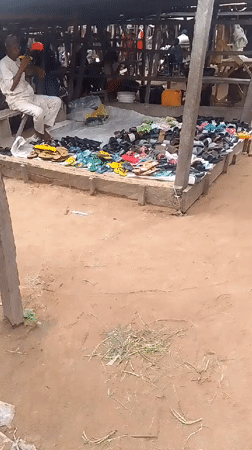 Afternoon street life and mobile charging in Jalingo