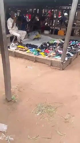 Afternoon street life and mobile charging in Jalingo