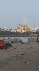 Debris clutters Mumbai beach near Lilavati Hospital