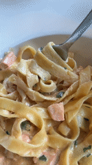 Lunch date documented at Dmitrov restaurant with pasta and flowers