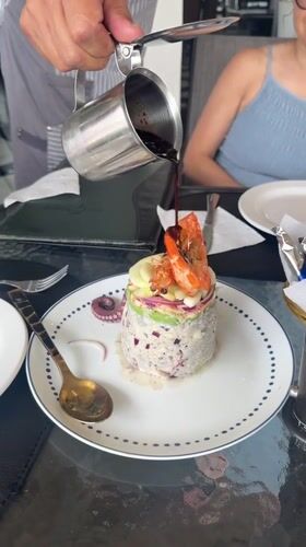 Diner documents seafood meal and dessert course in Puebla