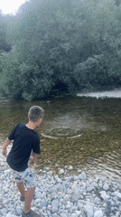 Afternoon stop at a rocky riverbank near Saint-Claude