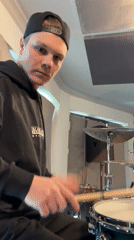 Drummer practices in Russian recording studio