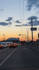 Dusk drive through Kazan captures evening traffic scene