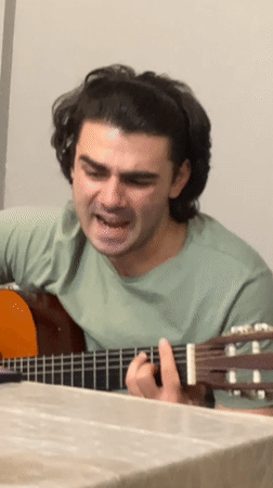 Acoustic guitar performance captured in Ruse, Bulgaria evening session