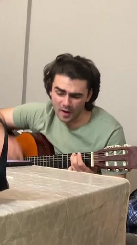 Acoustic guitar performance captured in Ruse, Bulgaria evening session