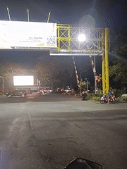 Night footage captures railway crossing scene in Surabaya