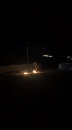 Nighttime fire spinning show lights up rural Morocco