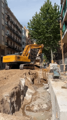 Morning scenes across Barcelona capture construction work, pedestrian activity