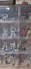 Collector documents Gundam models and cat in Dunnae-myeon home