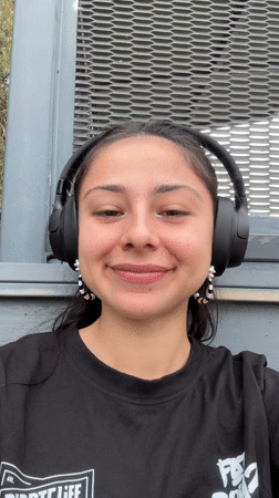 Woman with headphones photographed in Bicton morning scene