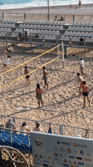 Beach volleyball and telescope viewing captured in Fethiye
