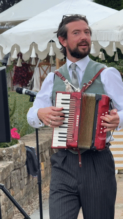 Accordion performance at a Cotswold manor outdoor event