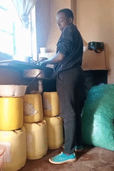 Morning dish washing captured in Lumakanda ward kitchen