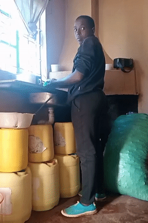 Morning dish washing captured in Lumakanda ward kitchen