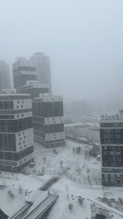 Heavy snow blankets Yekaterinburg's modern cityscape in April