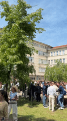 Formal gathering documented outside Burgas building