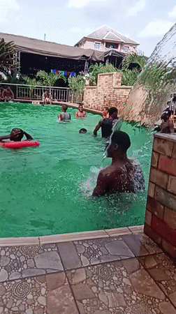 Young men enjoy afternoon swim session in Onitsha pool