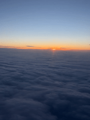 Aerial view captures cloud formations over Moldova from airplane