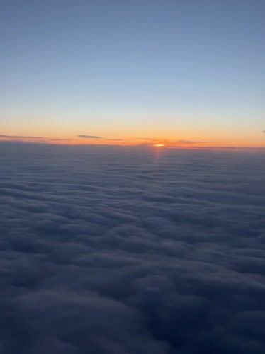 Aerial view captures cloud formations over Moldova from airplane