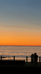 Cape Town residents gather for sunset viewing at waterfront