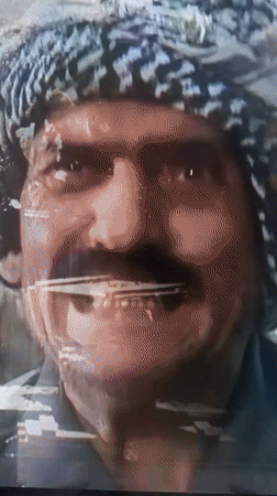 Person works among wooden crates in Tinaquillo, Venezuela