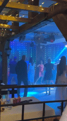 Night out at a Chaikovsky club, dancing and drinks.