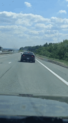 Sports car performs burnout on Russian highway