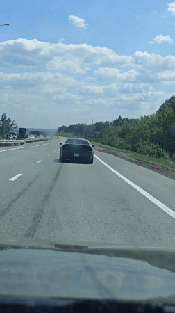 Sports car performs burnout on Russian highway
