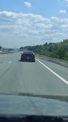 Sports car performs burnout on Russian highway