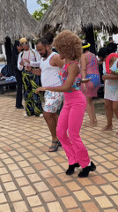 Outdoor dance party on a tropical patio in Porlamar