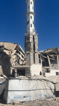Destroyed mosque and rubble-strewn surroundings in Gaza