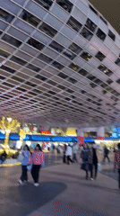 Food sampling observed at Shanghai shopping district vendor stall