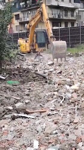 Morning life in Batumi: construction work, resting dog, vendor