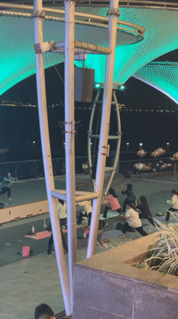 Nighttime yoga class draws participants to Jakarta waterfront mall