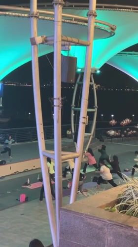 Nighttime yoga class draws participants to Jakarta waterfront mall