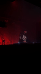 DJ performs at red-lit nightclub in Rosario