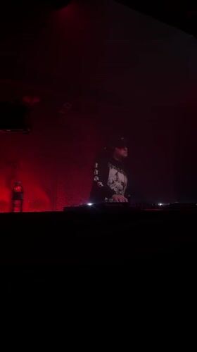 DJ performs at red-lit nightclub in Rosario
