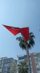 Outdoor event preparations underway along Yenişehir waterfront promenade