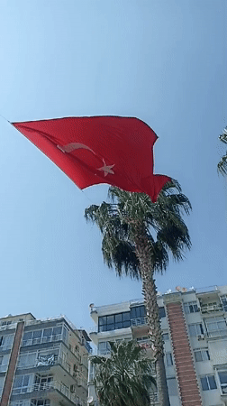 Outdoor event preparations underway along Yenişehir waterfront promenade